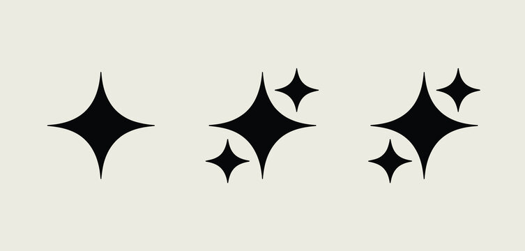 Minimalist black four pointed stars sparkle icons on light beige background