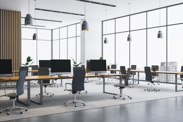 Modern empty open-space office interior with sleek desks, panoramic windows, and city view during daylight in a contemporary corporate building. 3D Rendering