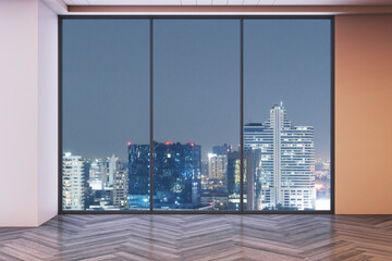 Modern empty room interior with large glass window overlooking illuminated cityscape during night in contemporary high-rise building design template. 3D Rendering © Who is Danny