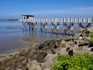 Fisherman's Cabin or carrelet on the rocky coast at Châtelaillon-Plage, a commune in the Charente-Maritime department, administrative region of Nouvelle-Aquitaine, France.