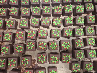 Rows of Festive Christmas Treats Decorated with Holiday-Themed Designs