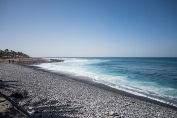 beautiful view of the beach sea shore with stones Canary Islands Tenerife