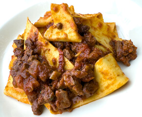 Delicious pappardelle with meat ragù pasta. Traditional Italian food