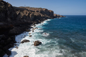 beautiful view of the beach ocean shore with rocks and cliffs with beautiful waves on the island of Tenerife Canary Islands Spain