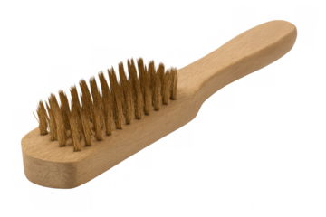 Close-up of a brass wire brush with a wooden handle, isolated on a transparent background, ready for cleaning and scrubbing tasks