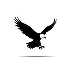 Obraz premium Soaring Silhouette: A majestic bald eagle, captured in a striking silhouette, spreads its powerful wings against a backdrop of stark simplicity, symbolizing freedom.