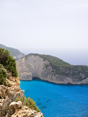 Scenic panorama of Navagio Bay, Zante Island, Greece, captured from the top viewpoint above the cliffs.