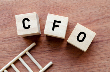 CFO Label on Wooden Cubes Indicating Financial Authority