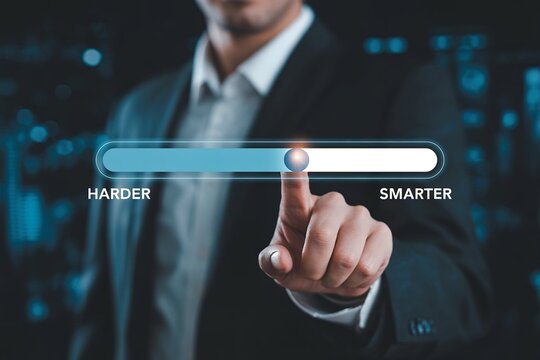 businessman's hand interacts with a digital slider.The concept of success through using smart methods with less effort instead of hard methods.