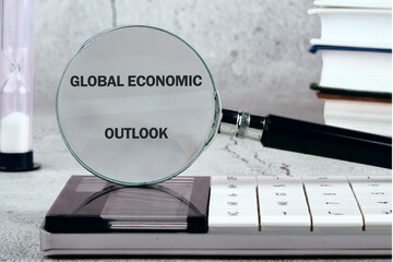 GLOBAL ECONOMIC OUTLOOK conceptual text, business concept