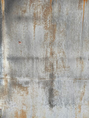 Aged and weathered rusty metal wall