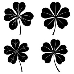 Fototapeta premium Four black shamrocks and clovers with stems arranged in a grid pattern on a white background image