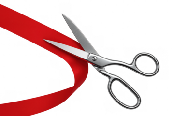Shiny metal scissors cutting a bright red ribbon on a transparent background, ideal for grand openings or ceremonies