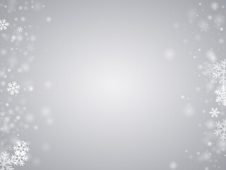 Snowflakes over gray sky background