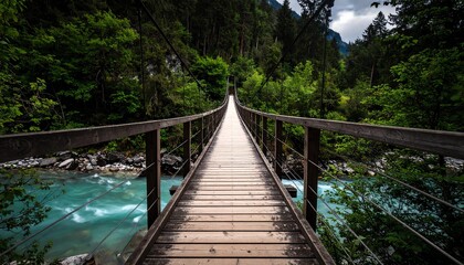 A wooden suspension bridge gracefully spans a vibrant turquoise river, leading into the heart of a lush, ancient forest, inviting adventure and tranquility.