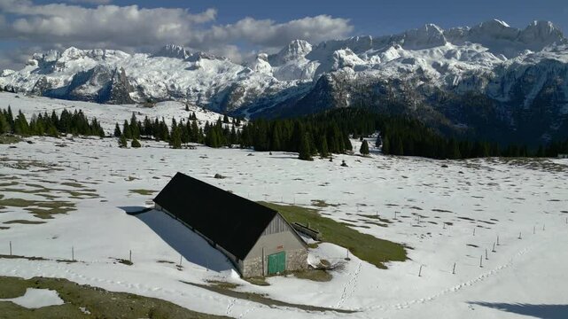 Spring snow on the Montasio plateau. Looking down on Montasio and Canin from above.