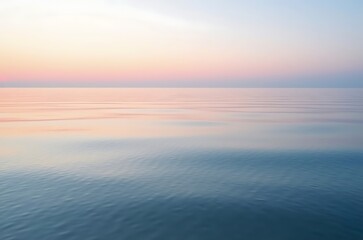 Fototapeta premium Tranquil Pink Sunset Ocean Vista Soft Light Calm Waves ai generated