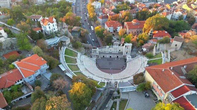 Aerial view of the ancient Roman theater of Philippopolis in Plovdiv, Bulgaria, during a beautiful sunrise