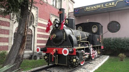 Istanbul, Turkey - 5th of March 2024: 4K Viewing vintage steam locomotive on display at Sirkeci Station

