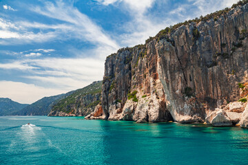 Dramatic Sardinian cliffs rising from turquoise sea in Gulf of Orosei