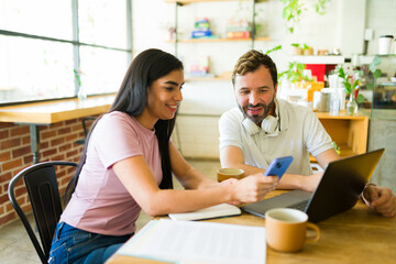 Freelancers collaborating in a cozy coffee shop
