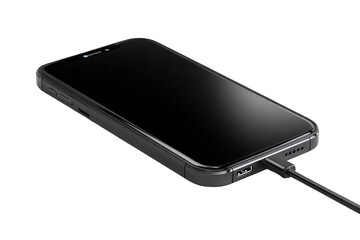 A close up view of a black smartphone charging with a cable on a dark background surface