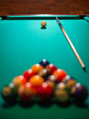 Billiard balls on a green billard table