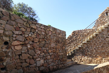 Stairs of the stone wall of Tossa de Mar, on the Costa Brava