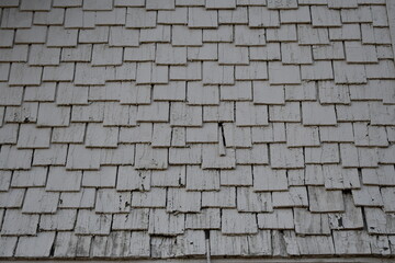 Old style wooden siding. Cedar planks offset.