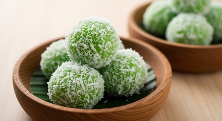 Klepon, also known as onde-onde, is indonesian traditional cake. Klepon is made from glutinous rice flour mixed with pandan juice and filled with liquid brown sugar and formed into small balls