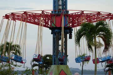 Tropical Swing Ride: A Colorful Carnival Dream in Motion
