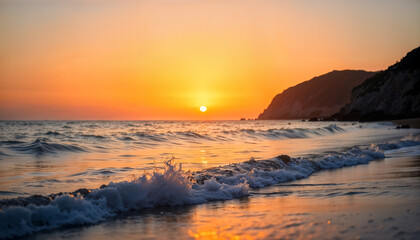 Fototapeta premium A serene photograph of a calm ocean at sunset, featuring gentle waves in the foreground reflecting warm golden and orange hues from the setting sun. The horizon includes silhouetted cliffs on the righ