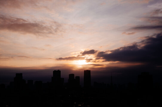 Urban Skyline at Sunset with Dramatic Clouds &ndash; Tokyo Silhouette