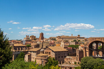 Historic rooftops and ancient ruins in central Rome. 
View of Roman rooftops, ruins and landmarks...