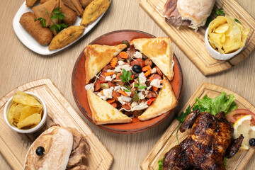 many different traditional portuguese food dishes meal set on table