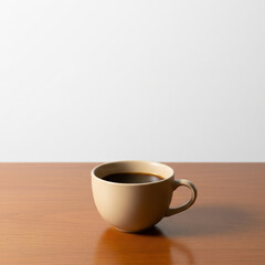 cup of coffee on wooden table