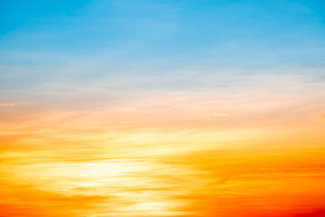 Beautiful , luxury soft gradient orange gold clouds and sunlight on the blue sky perfect for the background, take in evening,Twilight, Large size, high definition landscape photo