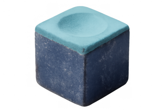 Blue billiard chalk cube displaying chalky wear, powdery surface crumbling, resting against transparent backdrop