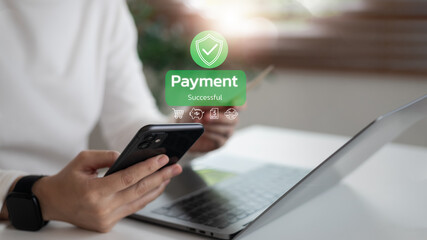 User holding smartphone showing payment successful notification with security icon. Concept of...
