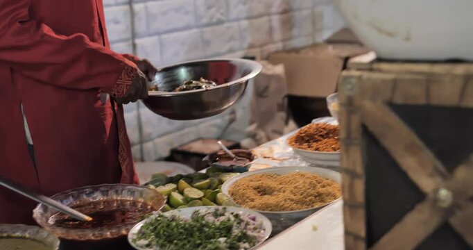 Indian caterers preparing delicious chat, panipuri, bhel, and patis at a festive event, showcasing vibrant flavors and traditional street food culture