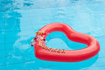 heart shaped float ,snorkeling, and summer items at the resort pool