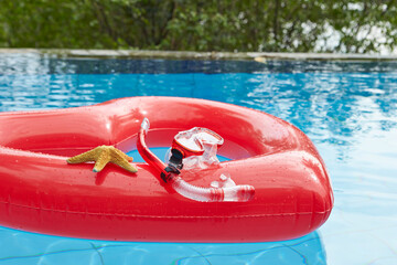 heart shaped float ,snorkeling, and summer items at the resort pool
