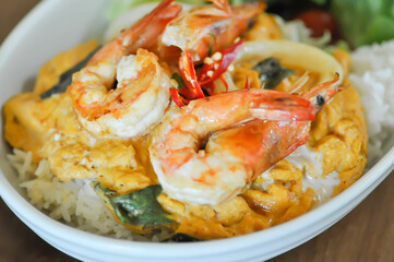 creamy omelet or omelet or omelette or fried egg with shrimp and squid or seafood omelette and rice