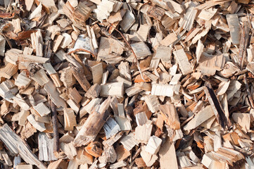The photo shows a close-up of wood chips