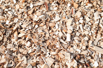 The photo shows a close-up of wood chips