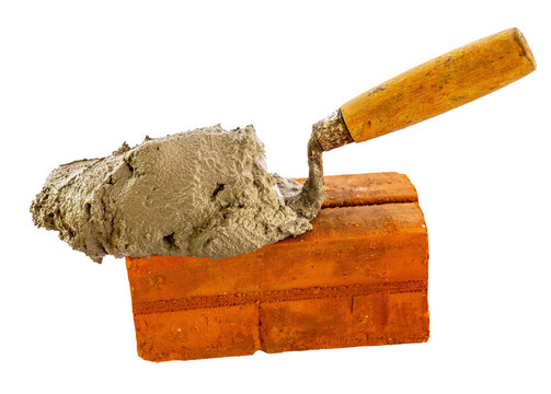 Bricklaying with Trowel and Mortar &ndash; Construction Work Close-Up and construction concept idea