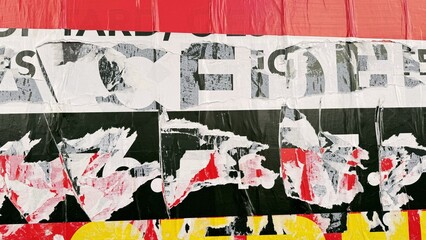 Fototapeta premium Torn street posters creating abstract urban artwork with film aesthetic