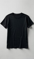Black t-shirt folded neatly on a neutral background, black tshirt mockup, texture, smooth