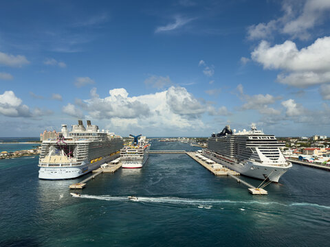 Royal Caribbean Symphony of the Seas, Carnival Elation and the MSC Seashore docked in Nassau, Bahamas.