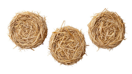 Three isolated straw nests on transparent background with natural texture and dry material